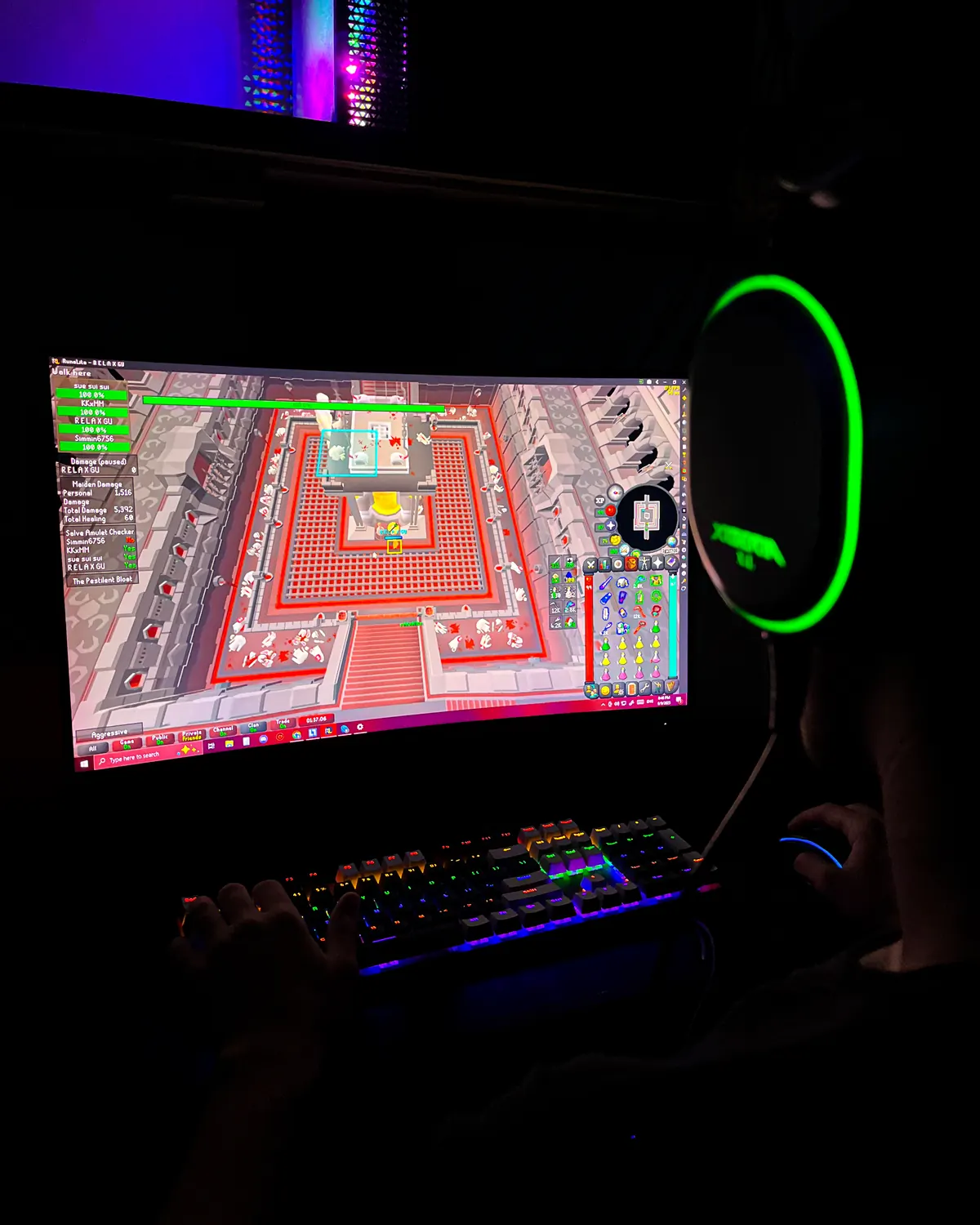 A booster part-way through an OSRS raid at his station